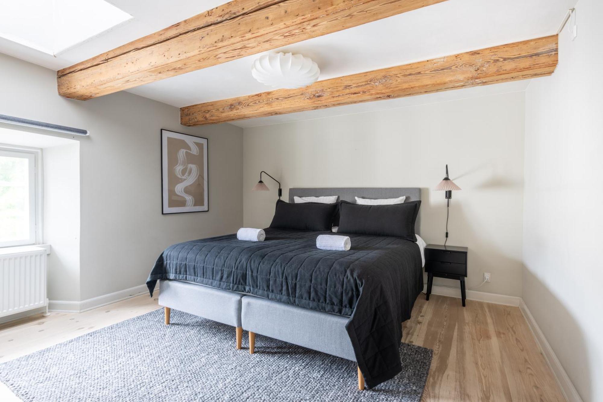 With Exposed Ceiling Beams