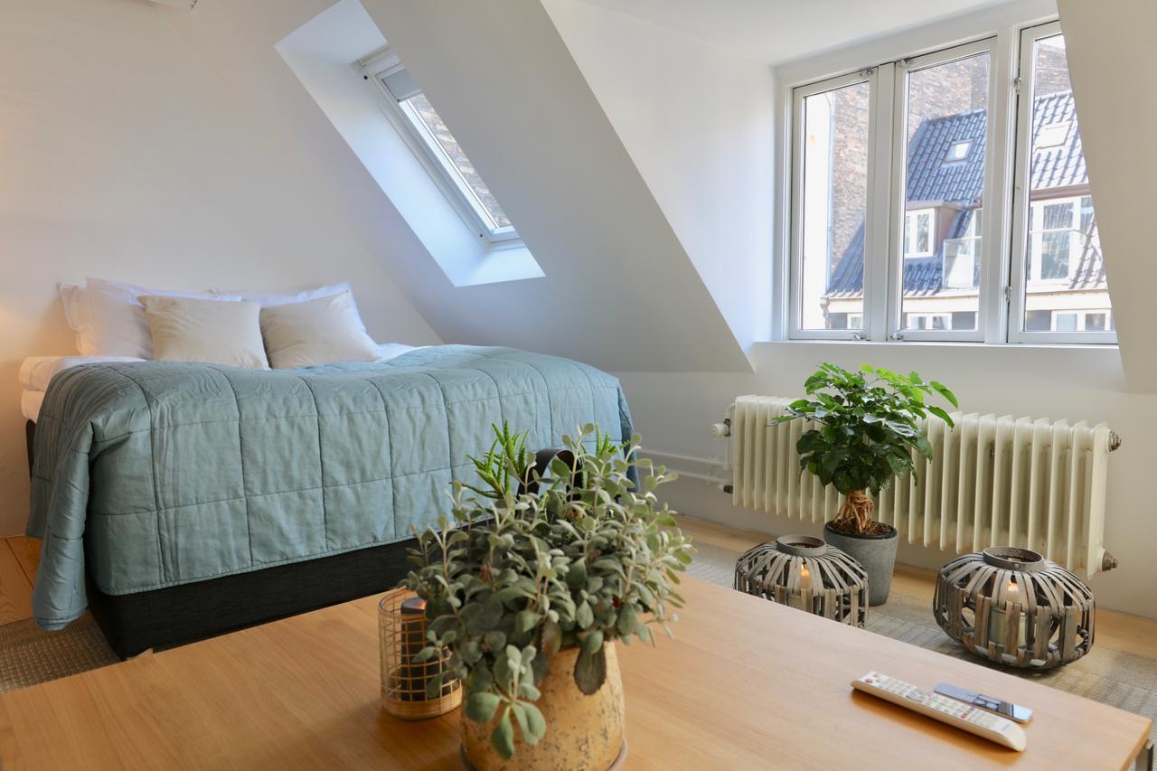 Two-story By Nyhavn Harbour