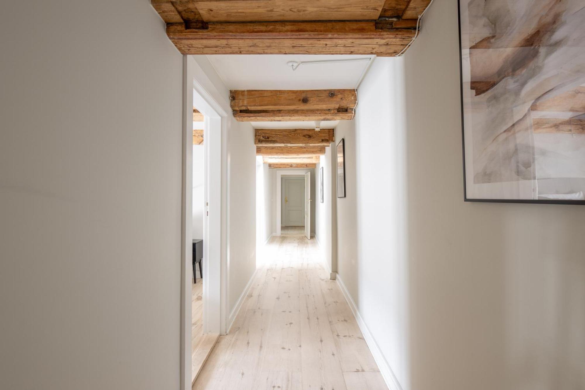 With Exposed Ceiling Beams