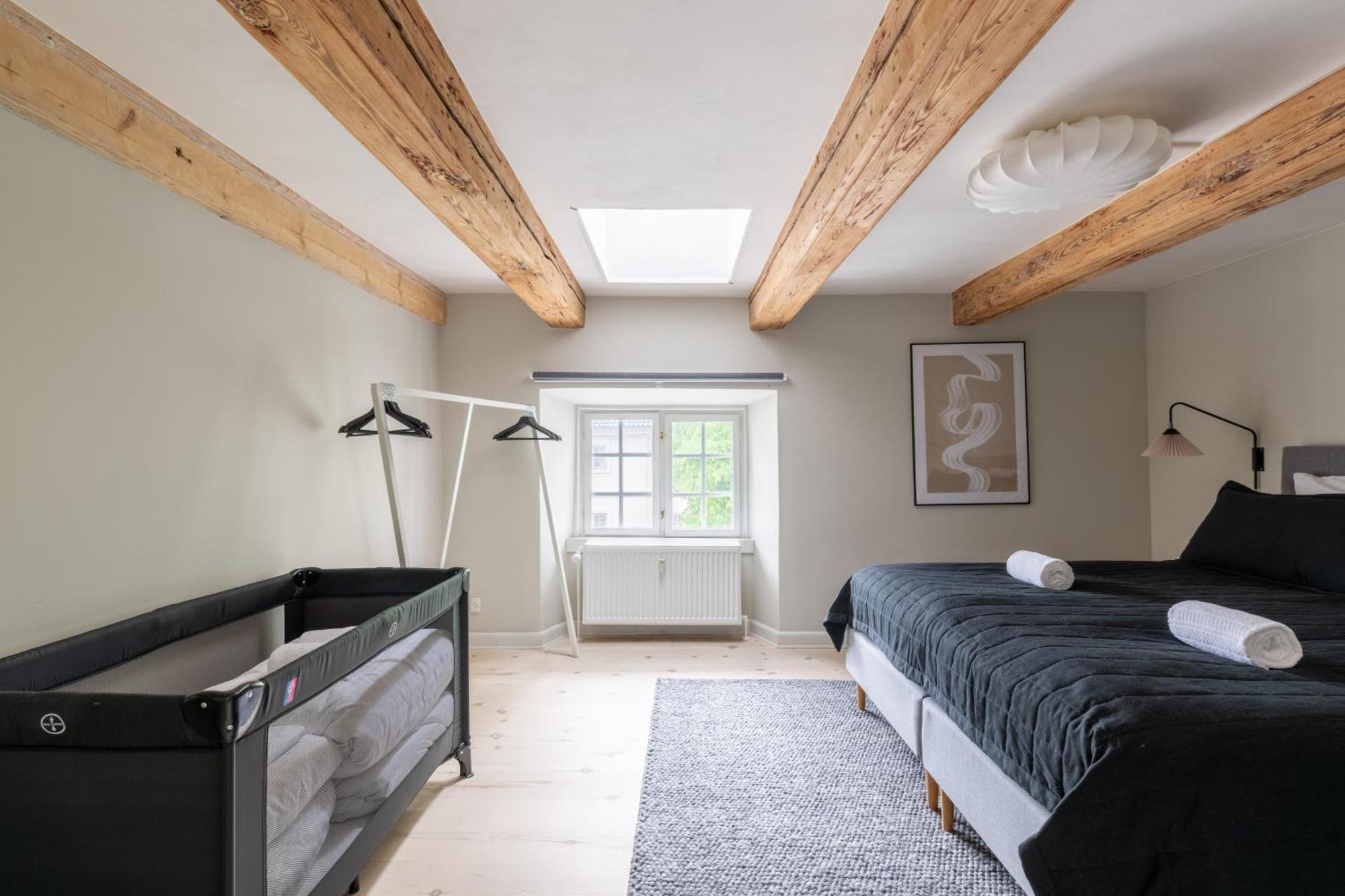 With Exposed Ceiling Beams